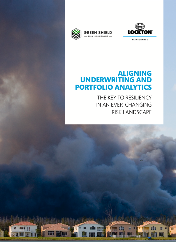 A row of suburban houses stands in front of a large, dark cloud of smoke rising from a wildfire. At the top, logos for Green Shield Risk Solutions and Lockton Reinsurance are shown, with text about underwriting and portfolio analytics.