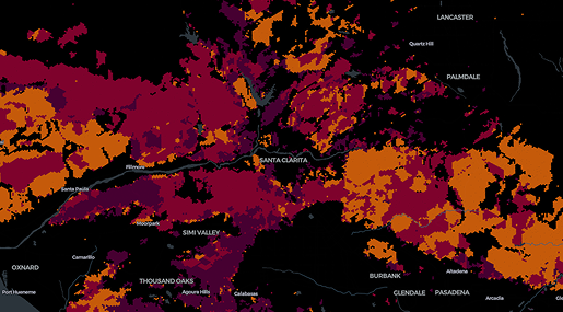 Map showing wildfire risk levels near Santa Clarita, Simi Valley, and surrounding areas, with red, orange, and purple shading indicating varying degrees of risk. Major city names and highways are labeled in white.