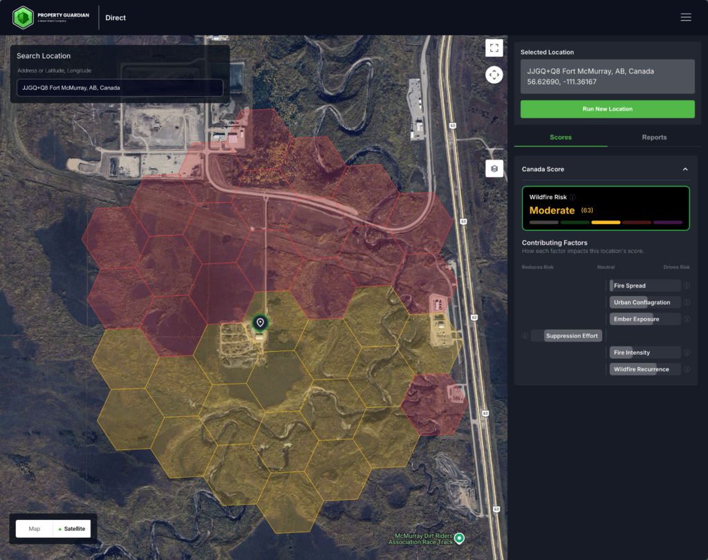 A satellite map showing a location in Fort McMurray, Alberta, Canada, with red and yellow zones indicating wildfire risk. The risk level is labeled “Moderate” on a sidebar with detailed contributing factors.